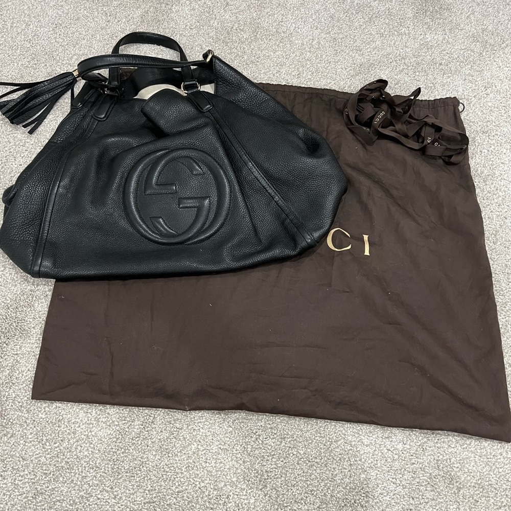 GUCCI LEATHER HOBO BAG W/ TASSEL
